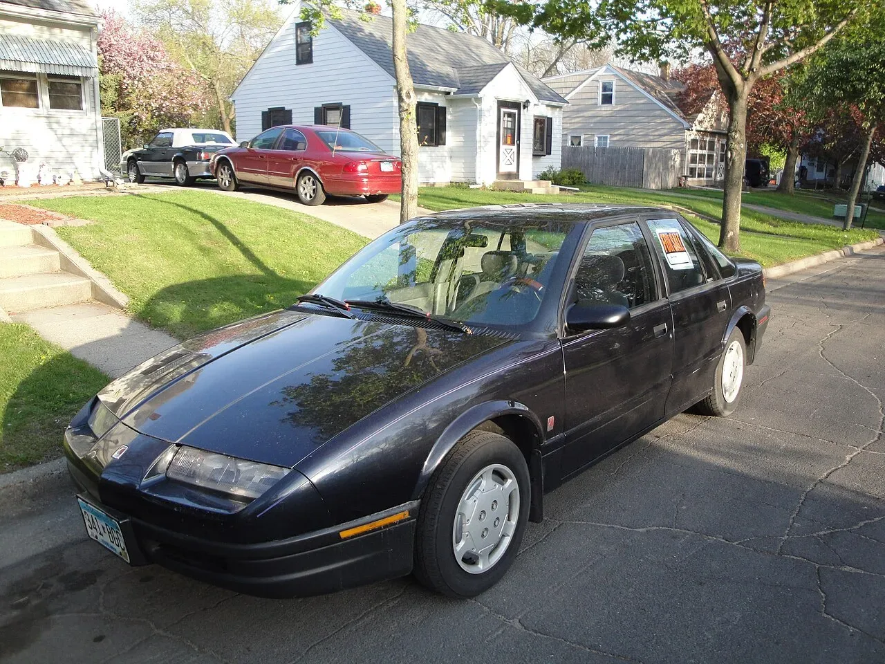 Saturn SL, side